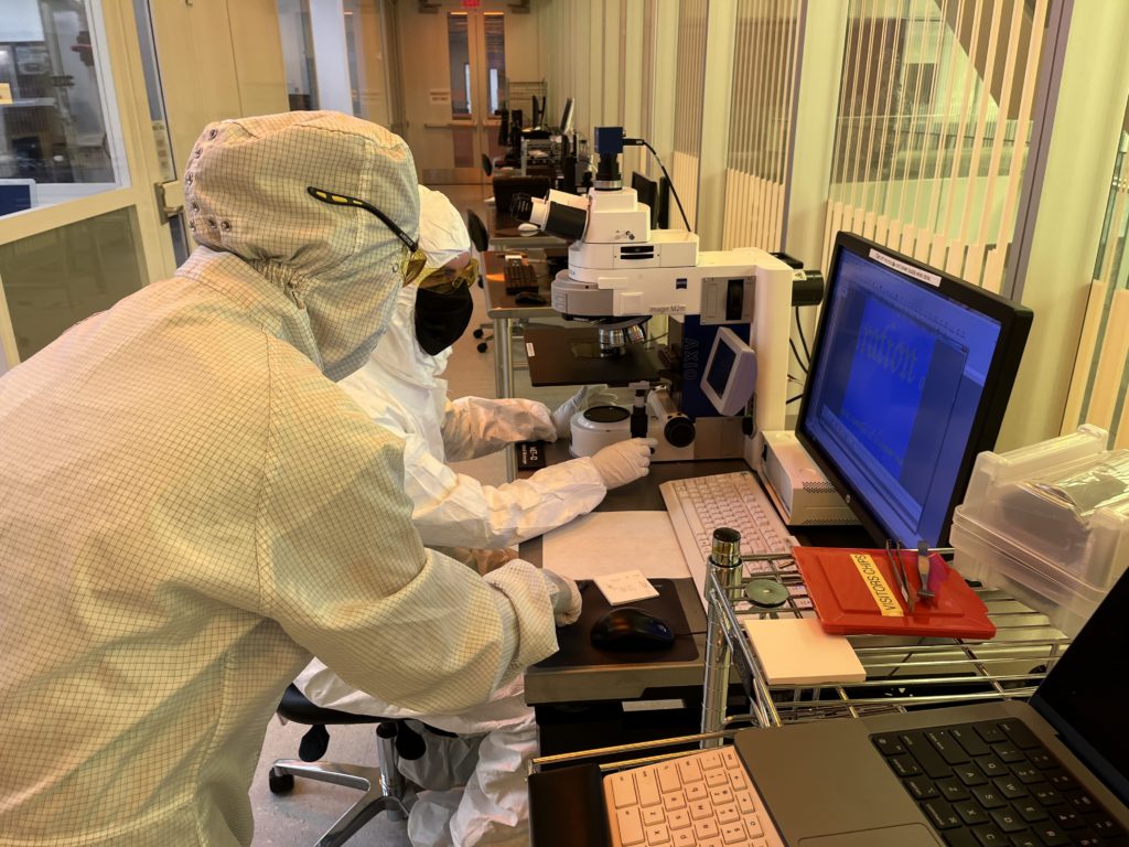 interns uses an optical microscope