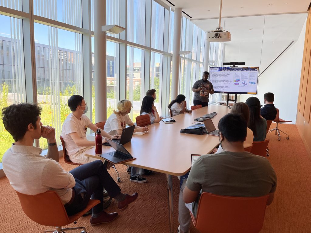 students meeting in conference room